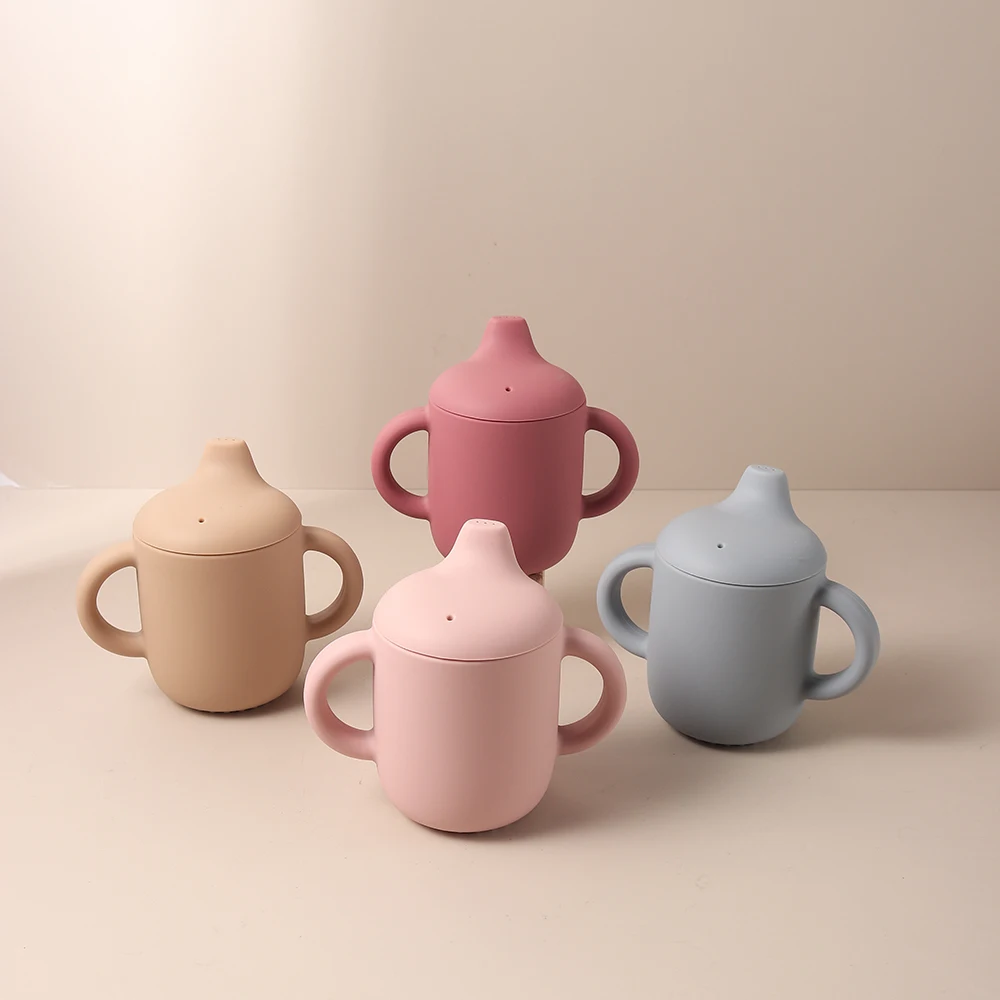 New solid 180ML Baby Silicone Sippy Cup BPA-Free Portable Feeding Cup Portable Learning Hand Shank Drinking Water training Cups