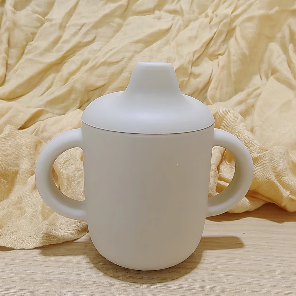 New solid 180ML Baby Silicone Sippy Cup BPA-Free Portable Feeding Cup Portable Learning Hand Shank Drinking Water training Cups - Image 11